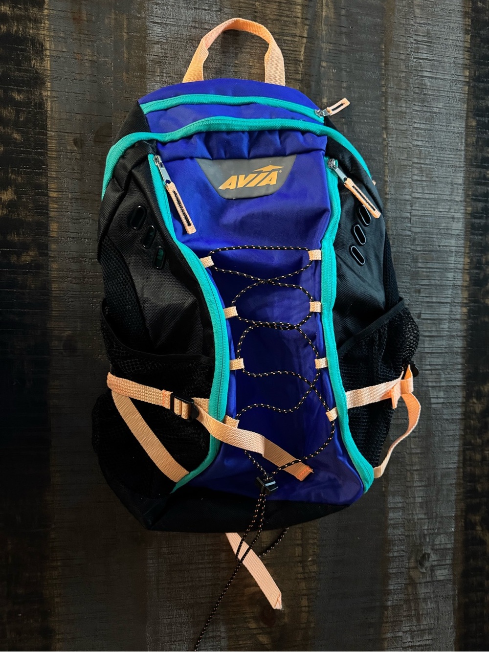 vintage Avia Sport Backpack in a blue, purple, teal, and black colorblock design